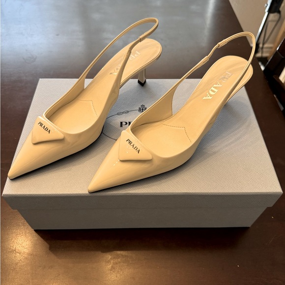 Prada Shoes - PRADA! Nude Patent leather slingback pumps